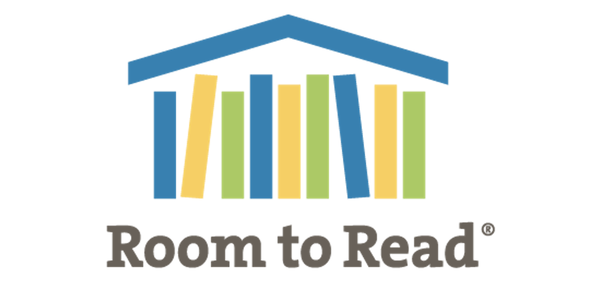 Room to Read logo showing, in the top part, the blue, yellow and green picture of a house containing books and, in the bottom part, the grey writing ‘Room to Read’ followed by a grey superscripted R.